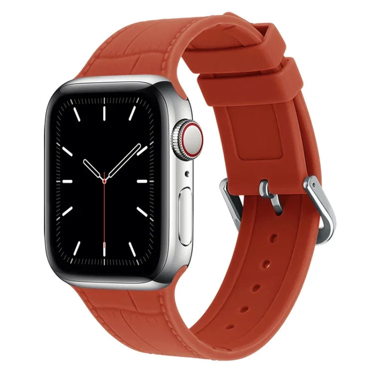 Bamboo joint silicone replacement strap for Apple Watch in vibrant orange color, compatible with multiple Apple Watch series.