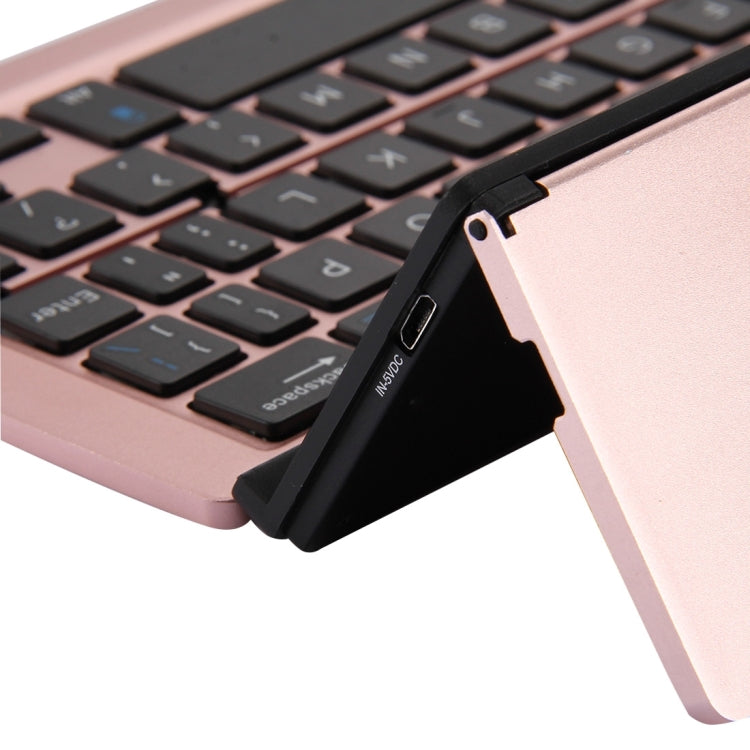 F18 Ultra-slim Rechargeable Foldable 58 Keys Bluetooth Wireless Keyboard with Holder