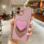 Ốp lưng điện thoại TPU kèm giá đỡ hình trái tim mạ điện, dành cho iPhone 17e / 16e, iPhone 17 Pro Max, iPhone 17 Pro, iPhone 17, iPhone Air, iPhone 16 Pro Max, iPhone 16 Pro, iPhone 16 Plus