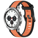 20mm two color silicone watch band for Galaxy Watch in black and orange on Samsung Galaxy Watch 4 Classic.