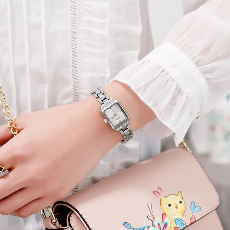 Đồng hồ thời trang công sở SKMEI 1407 đính kim cương tinh tế và thanh lịch, đồng hồ quartz hợp kim kẽm hình vuông cho nữ, màu bạc