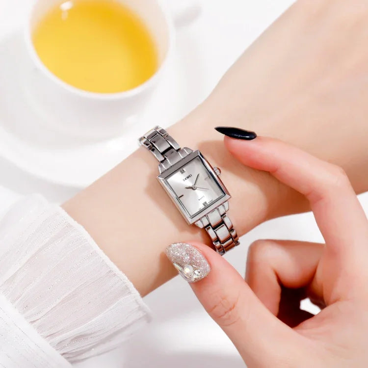 Đồng hồ thời trang công sở SKMEI 1407 đính kim cương tinh tế và thanh lịch, đồng hồ quartz hợp kim kẽm hình vuông cho nữ, màu bạc