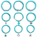 Vòng tay hạt phong cách dân tộc đá Turquoise nữ, S2208-2 Cú, S2208-3 Bướm, S2208-4 Sao biển, S2208-5 Cây sự sống, S2203-12 Thánh giá, S2203-13 Mặt dây chuyền Turquoise, S2212-1 Mắt, S2303-1, S2303-2 Rùa, S2303-3 Thánh giá, S2303-4 La bàn, S2203-11