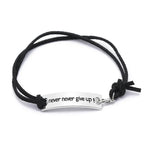 Vòng tay da nhung đơn giản với chữ "Never Give Up" (Không bao giờ bỏ cuộc)