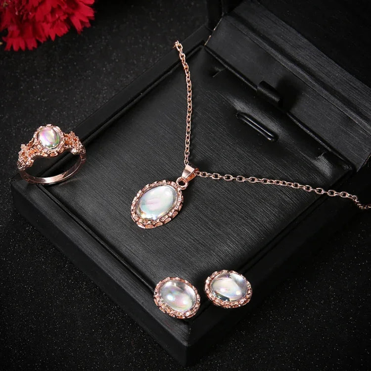 Bộ trang sức nữ gồm dây chuyền, bông tai, nhẫn đá Opal pha lê