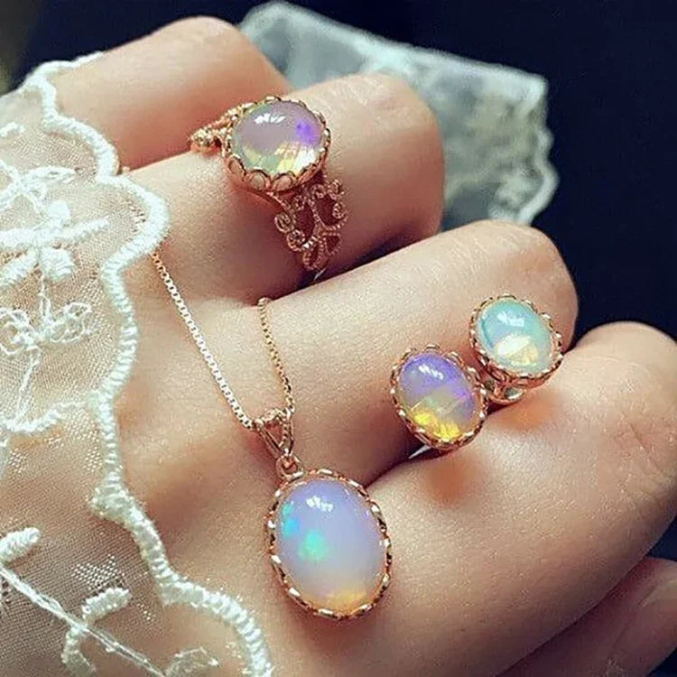 Bộ trang sức nữ gồm dây chuyền, bông tai, nhẫn đá Opal pha lê